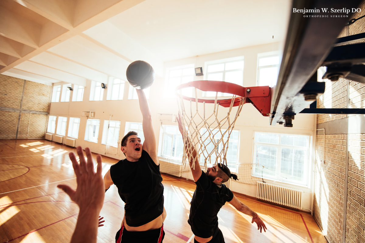 An athlete playing basketball after recovering from a shoulder injury and regaining shoulder strength and mobility in Texas.